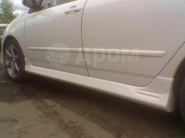 картинка Комплект обвесов для Toyota Corolla 120/ Fielder магазин  StreetTuning 