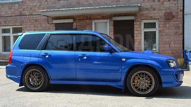 картинка Обвес (Клыки) на пороги и задний бампер для Subaru Forester SG магазин  StreetTuning 