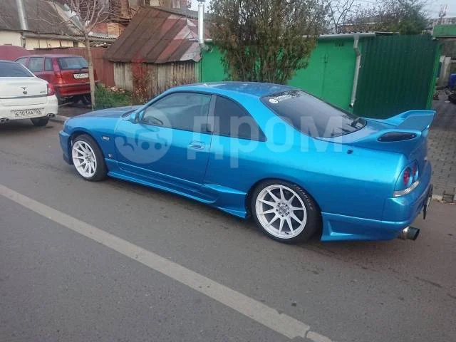 картинка Накладки на задний бамперBomex на Nissan Skyline R33, R33GTR магазин  StreetTuning 