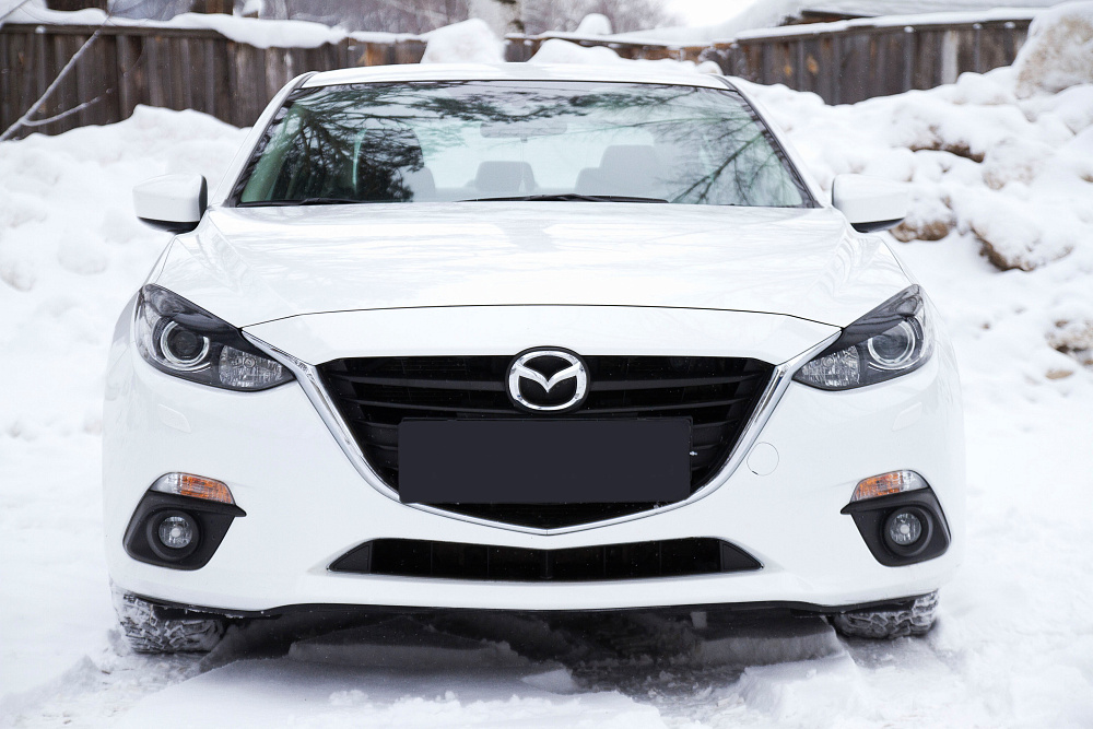 картинка Mazda 3 (седан) 2013-2016 (III дорестайлинг) Накладки на передние фары (реснички) от магазина  StreetTuning