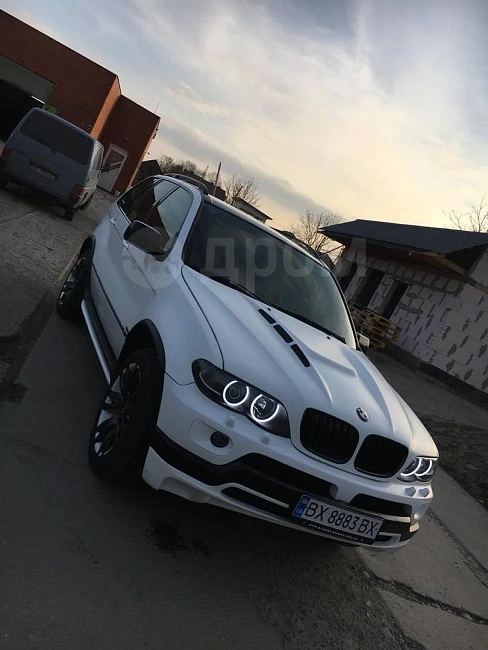 картинка Передняя юбка в стиле 4.8 для Bmw X5 E53 Рестайлинг магазин  StreetTuning 