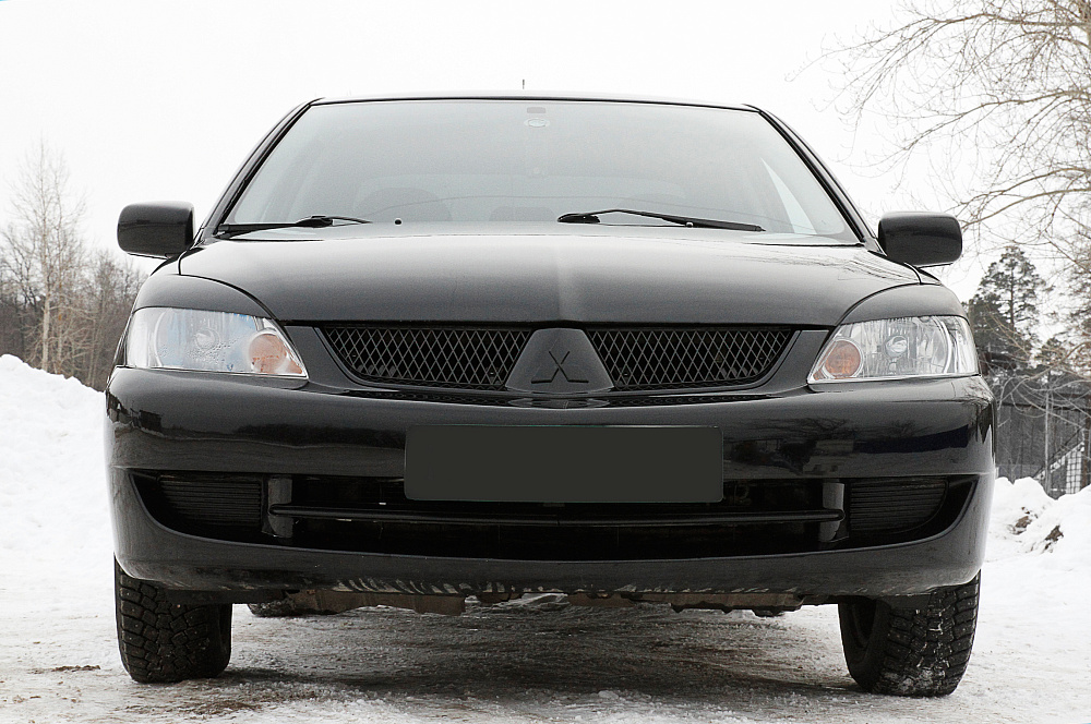 картинка Mitsubishi Lancer IX 2005—2007 Накладки на передние фары (реснички) компл.-2 шт. Вариант 1 от магазина  StreetTuning