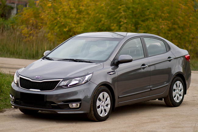 картинка Kia Rio III (седан) 2015-2016 Накладки на передние фары (реснички) магазин  StreetTuning 