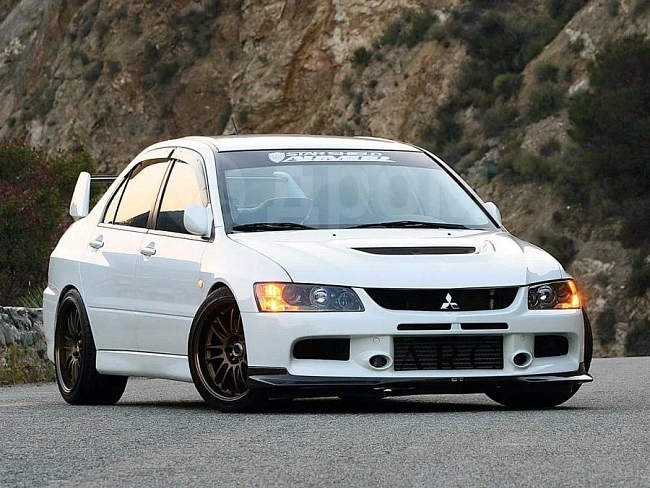 картинка Накладка на передний бампер Ralli Art для Mitsubishi Lancer Evo 9 магазин  StreetTuning 
