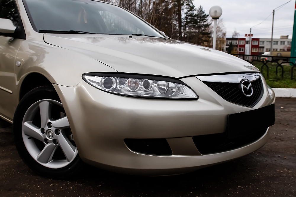 картинка Mazda 6 2002—2007 Накладки на передние фары (реснички) компл.-2 шт. от магазина  StreetTuning