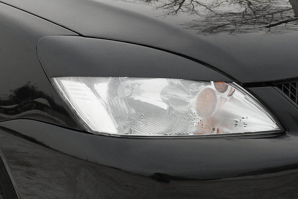 картинка Mitsubishi Lancer IX 2005—2007 Накладки на передние фары (реснички) компл.-2 шт. Вариант 1 от магазина  StreetTuning