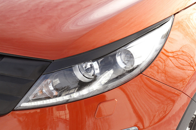 картинка Kia Sportage 2010—2013 Накладки на передние фары (реснички) компл.-2 шт. магазин  StreetTuning 