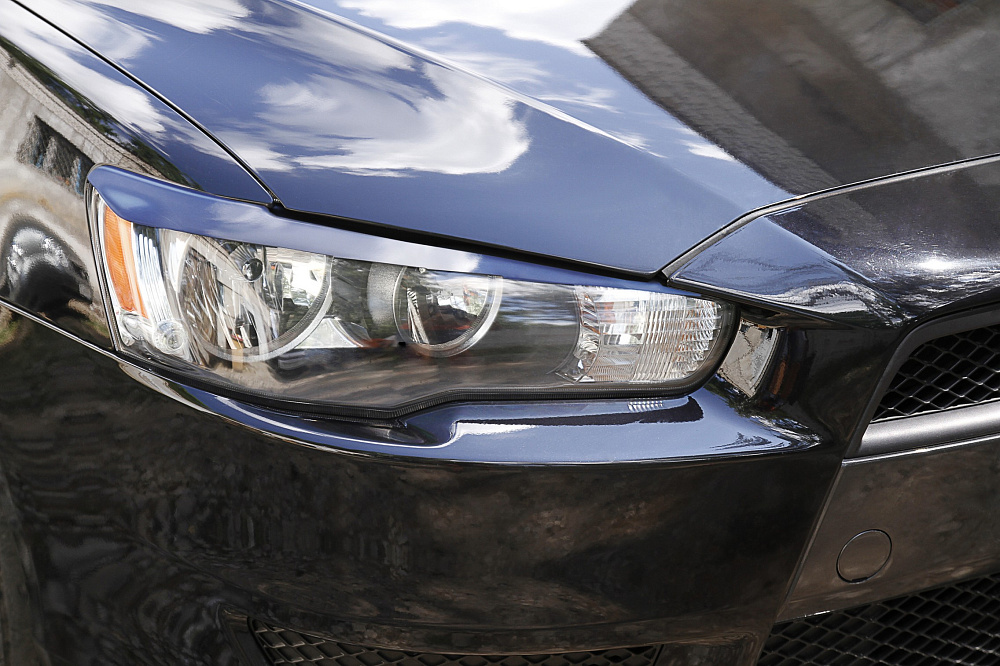 картинка Mitsubishi Lancer X 2011-2014 Накладки на передние фары (реснички) компл.-2 шт. от магазина  StreetTuning