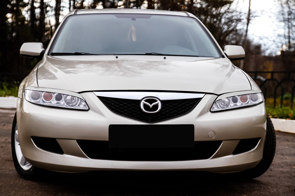 картинка Mazda 6 2002—2007 Накладки на передние фары (реснички) компл.-2 шт. от магазина  StreetTuning