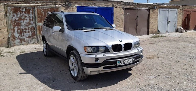 картинка Передняя юбка в стиле 4.8 для Bmw X5 E53 Дорестайлинг магазин  StreetTuning 