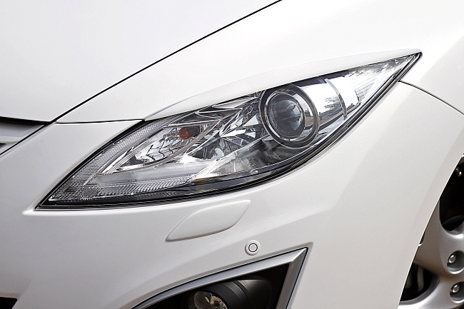 картинка Mazda 6 2010—2012 Накладки на передние фары (реснички) компл.-2 шт. магазин  StreetTuning 