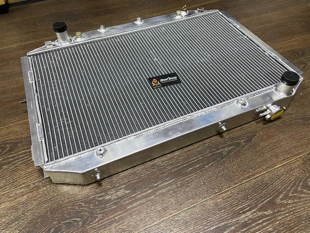 картинка Радиатор алюминиевый Toyota Land Cruiser 80 1HDFT, 1HDT, 1HZ 50мм AT от магазина  StreetTuning