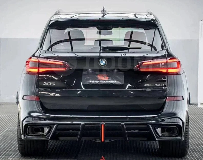 картинка Диффузор на задний бампер для BMW X5 G05 M50i X/S , с стоп сигналом магазин  StreetTuning 