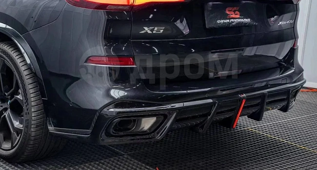 картинка Диффузор на задний бампер для BMW X5 G05 M50i X/S , с стоп сигналом магазин  StreetTuning 